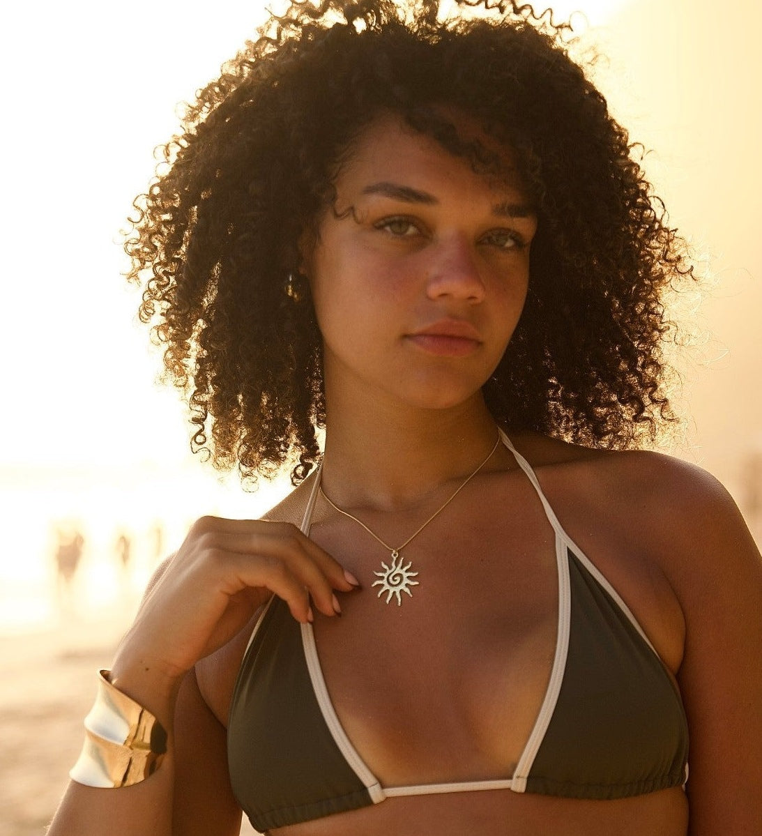 Akira sun necklace at sunset