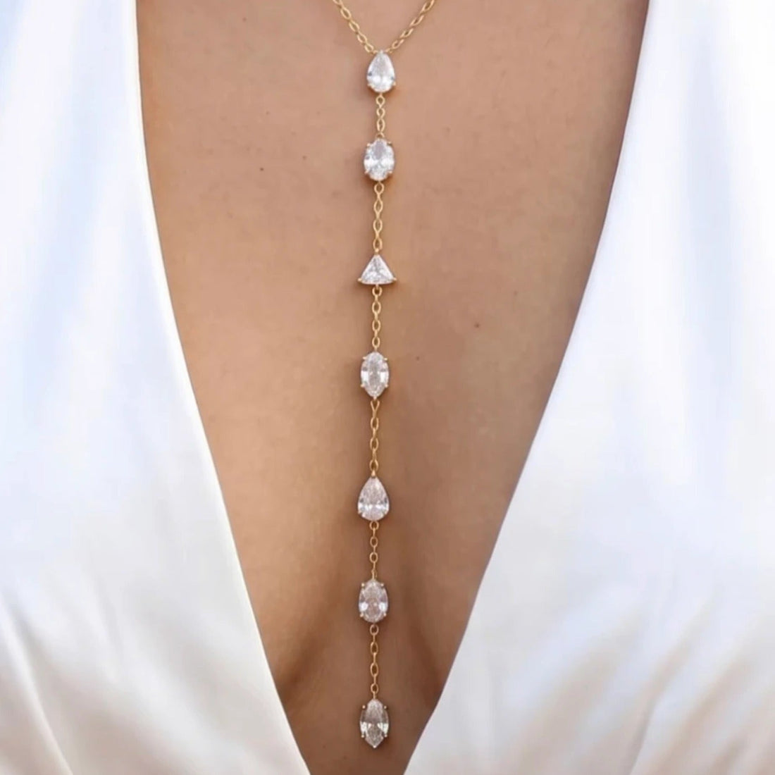 TAKI necklace worn