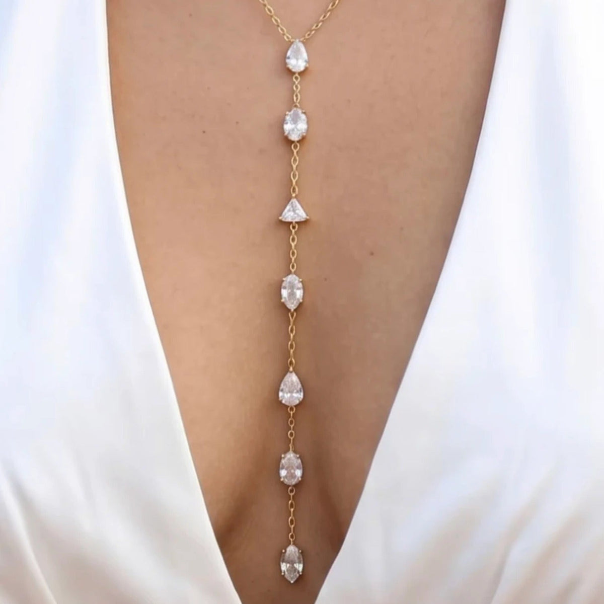 TAKI necklace worn