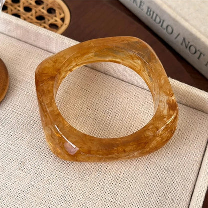 MIEL. amberkleurige bangle