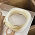 CRÈME. gemarmerde bangle
