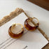 AMBRE. amberkleurige hoops